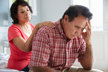 Photo of woman comforting concerned man