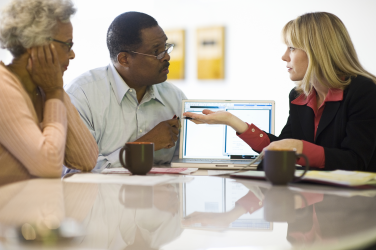 Picture of three people talking